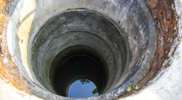 old brick and concrete deep well