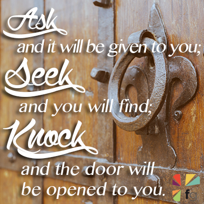 iron knocker on an old door of a monastery